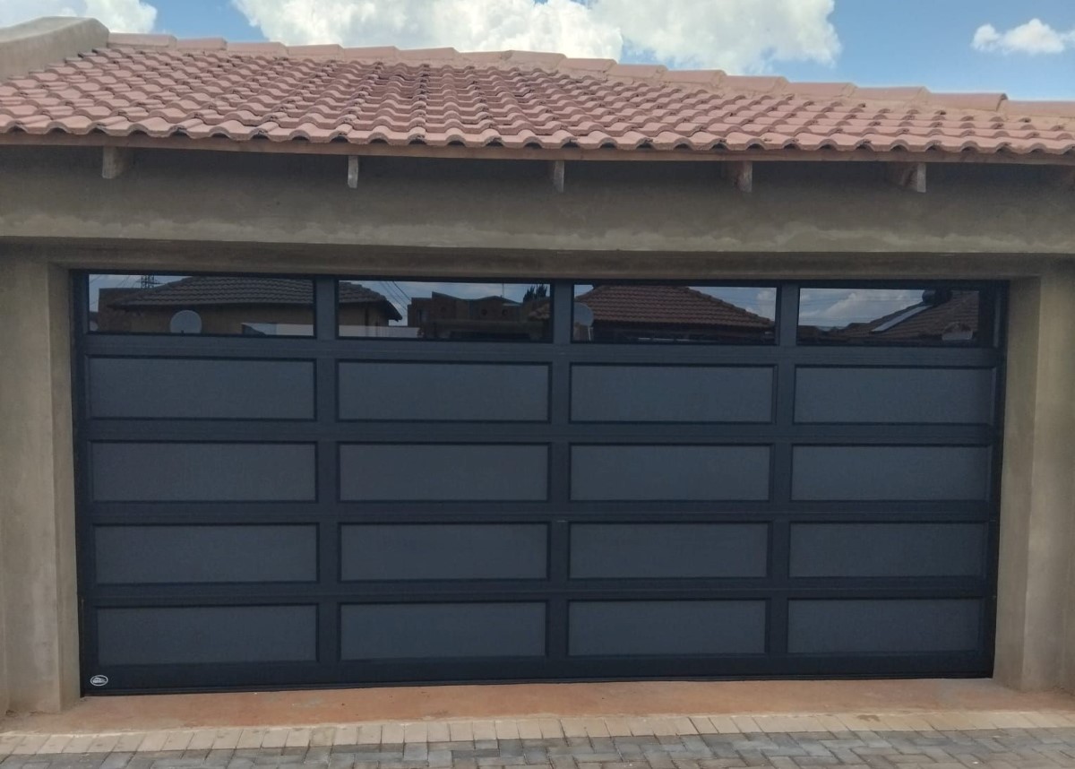 Double Aluzink Door - Durable and rust-resistant with a clean, metallic finish.